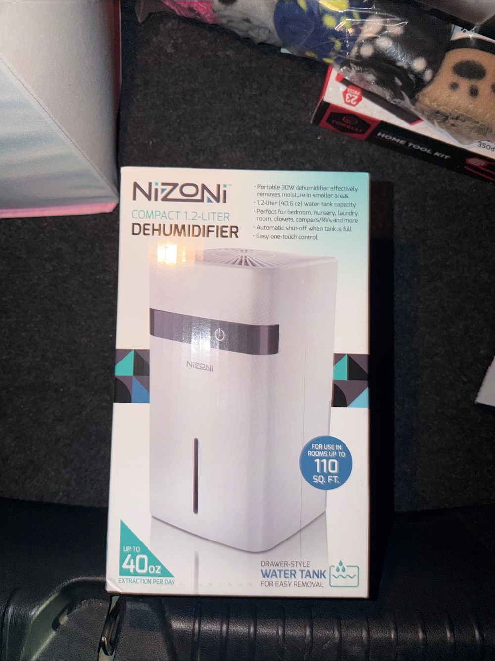 Compact 1.2-Liter White Dehumidifier - Portable Home Use